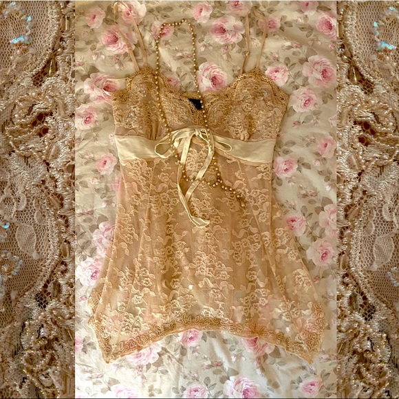 Beautifully detailed cream camisole by Express